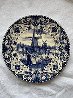 Delfs blauw wand bord, Ophalen