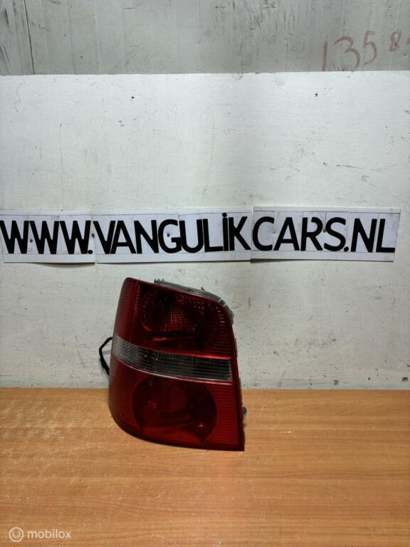 Achterlicht links origineel links Volkswagen Touran, Gebruikt, Volkswagen, Ophalen of Verzenden, Volkswagen