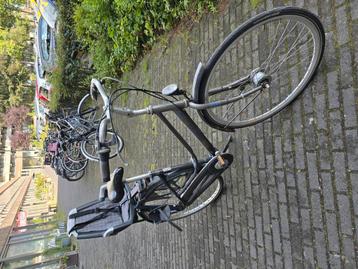 Dames fiets met kinderzitje  beschikbaar voor biedingen