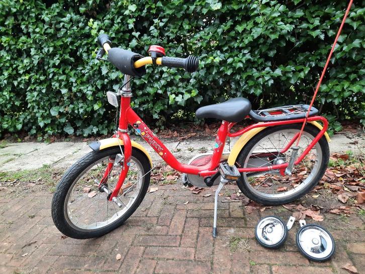 Rode Puky steel classic 16 inch met zijwieltjes, Fietsen en Brommers, Fietsen | Kinderfietsjes, Zo goed als nieuw, 16 tot 20 inch