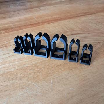 Handige kabel beheer clips beschikbaar voor biedingen