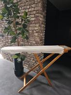 houten strijkplank, Ophalen