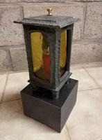 Graflantaarn op granieten voet, Ophalen