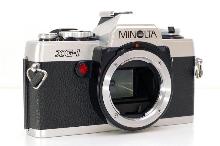 Minolta XG-1 body 35mm film SLR + nieuwe batterijen, Audio, Tv en Foto, Fotocamera's Analoog, Zo goed als nieuw, Spiegelreflex