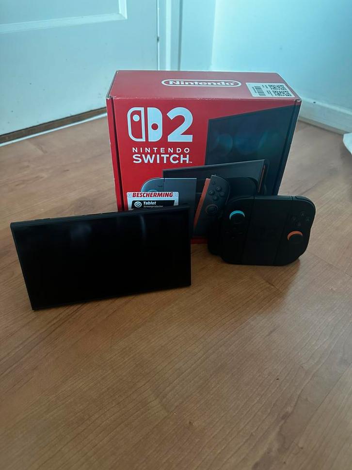 1 WEEK NIEUW - Nintendo Switch 2, met MK World, GAMES en BON, Spelcomputers en Games, Spelcomputers | Nintendo Switch, Zo goed als nieuw