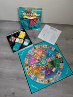 Trivial pursuit familie editie - spel - spelletje, Hobby en Vrije tijd, Gezelschapsspellen | Bordspellen, Ophalen of Verzenden