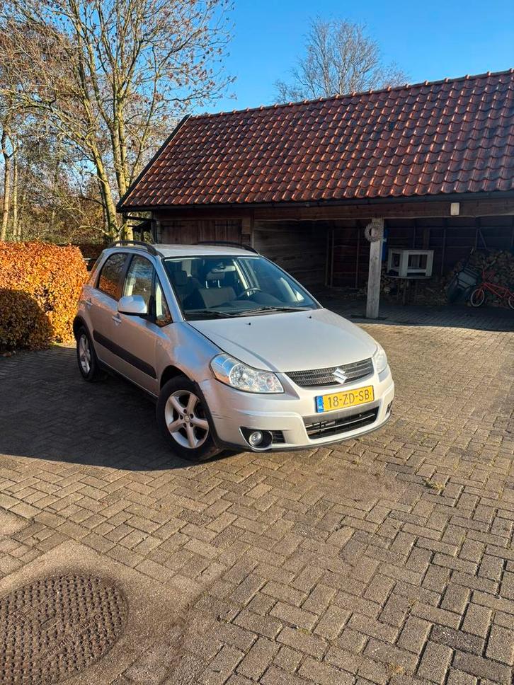 Suzuki SX4 1.6 2008 Grijs. Nieuwe APK, airco en trekhaak, Auto's, Suzuki, Particulier, SX4, Benzine, D, Hatchback, Handgeschakeld