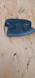 Oude Strijkijzer., Ophalen