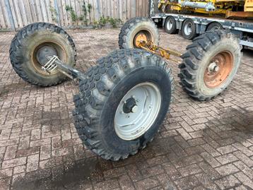 Landbouwas met banden 12.5 - 20 beschikbaar voor biedingen