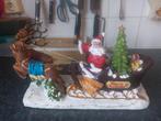 Kerstman op arreslee met licht en muziek - 33cm, Diversen, Kerst, Ophalen of Verzenden, Zo goed als nieuw