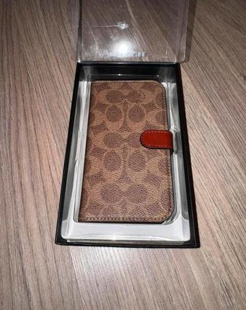 Coach iphone 14 pro  bookcase beschikbaar voor biedingen