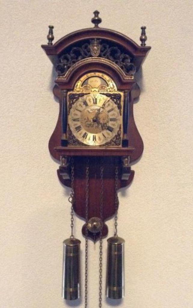 Antieke WARMINK wandklok, Huis en Inrichting, Woonaccessoires | Klokken, Zo goed als nieuw, Wandklok, Analoog, Ophalen of Verzenden