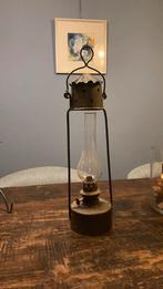 Koperen stormlamp, Ophalen