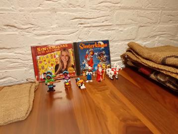 Sint: 2 CD's, 2 jute zakken, poppetjes, klein zakje beschikbaar voor biedingen