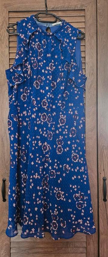 Blauwe jurk met oranje en witte bloemen  beschikbaar voor biedingen