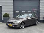 BMW 1-serie 116d High Executive | Lederen Bekleding | Naviga, Euro 5, 4 cilinders, Bruin, 116 pk
