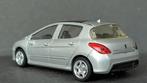 Peugeot 308 XT 2008 1:43 Rastar Pol, Hobby en Vrije tijd, Modelauto's | 1:43, Verzenden, Zo goed als nieuw