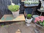 Oud tuintafeltje., Ophalen