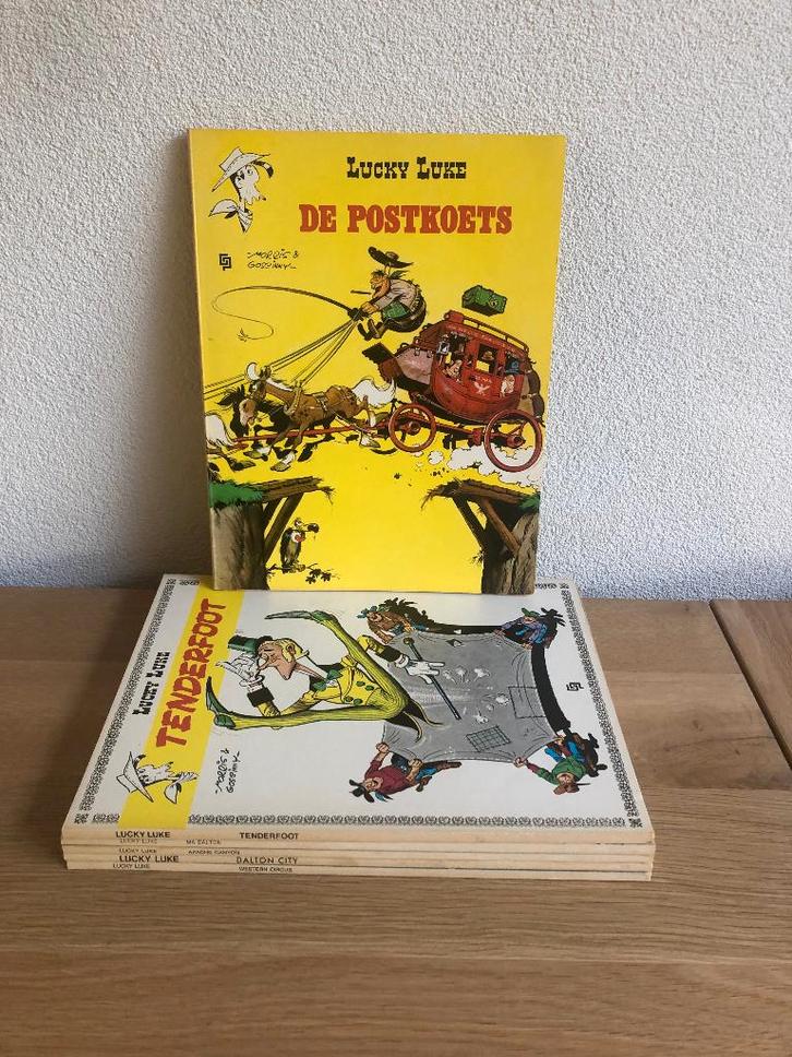 Lucky Luke 6 delen SC (o.a. Amsterdam Boek) 3x 1e druk, Boeken, Stripboeken, Gelezen, Meerdere stripboeken, Ophalen of Verzenden