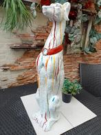 Stenen kunst hond, Ophalen