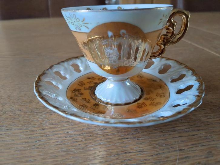 Kop en schotel met de kleuren goud, parelmoer, oranje, Verzamelen, Porselein, Kristal en Bestek, Zo goed als nieuw, Kop en/of schotel