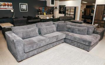 Grijze ribstof hoekbank met chaise lonque beschikbaar voor biedingen