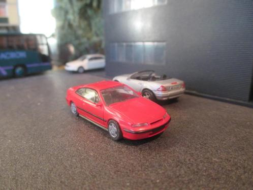 Opel Calibra - Rietze rood, Hobby en Vrije tijd, Modelauto's | 1:87, Zo goed als nieuw, Ophalen of Verzenden