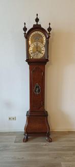 Christiaan Huygens staande klok met planterarium uurwerk, Ophalen