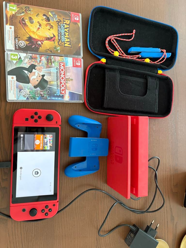 Nintendo Switch met 2 games en accessoires, Spelcomputers en Games, Games | Nintendo Switch, Gebruikt, 3 spelers of meer, Vanaf 7 jaar