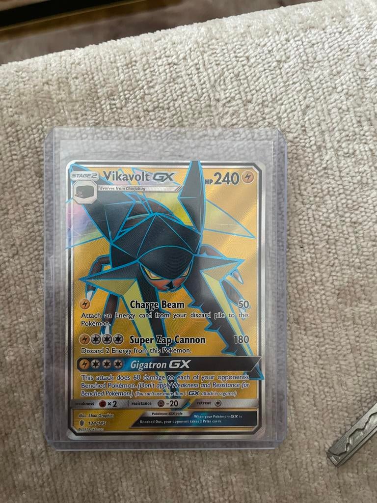 Pokemon kaart Vikavolt GX 134/145, Ophalen of Verzenden, Zo goed als nieuw, Losse kaart, Foil