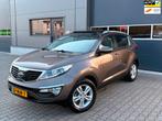 Kia Sportage 2.0 X-ecutive Plus Pack, Auto's, Gebruikt, Zwart, 4 cilinders, Bruin