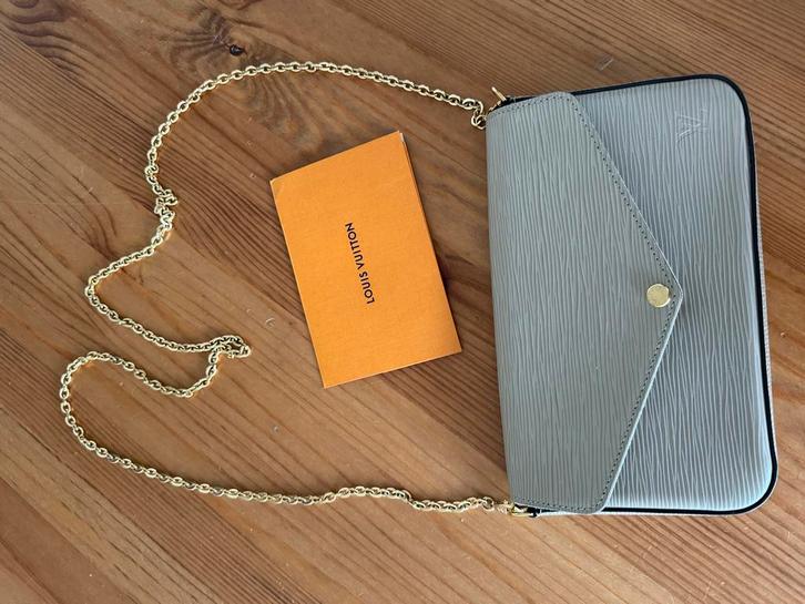 Louis Vuitton Félicie Pochette - Nieuwstaat, Sieraden, Tassen en Uiterlijk, Tassen | Damestassen, Nieuw, Schoudertasje, Grijs