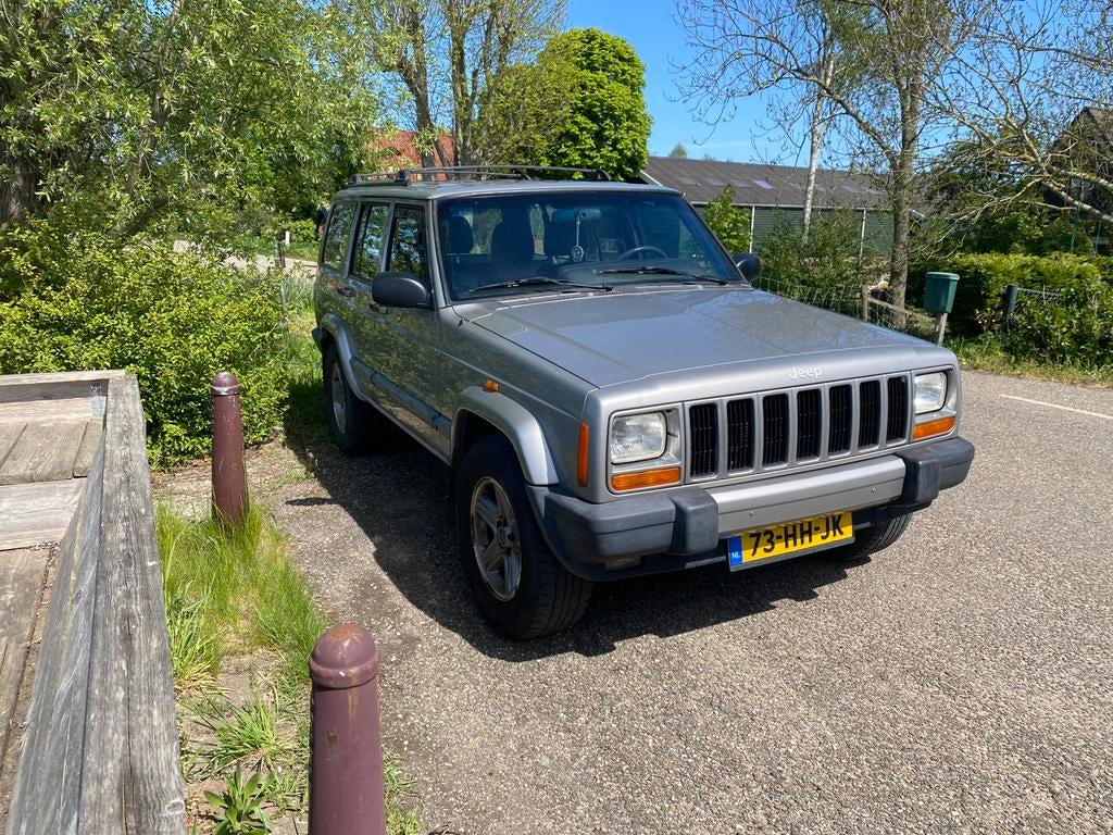 Jeep Cherokee 4.0 I AUT 2001 Grijs, Auto's, Jeep, Zwart, 3960 cc, Vierwielaandrijving, Particulier