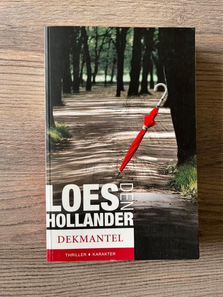 Loes den Hollander - Dekmantel, Boeken, Thrillers, Zo goed als nieuw, Ophalen of Verzenden