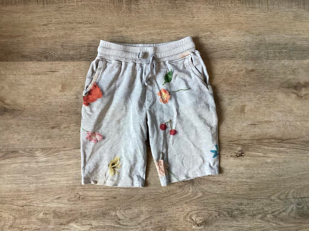 Snurk korte broek met bloemen (128), Broek, Gebruikt, Meisje, Ophalen of Verzenden