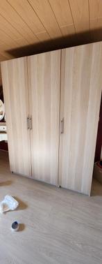 Houten kledingkast met drie deuren, Ophalen