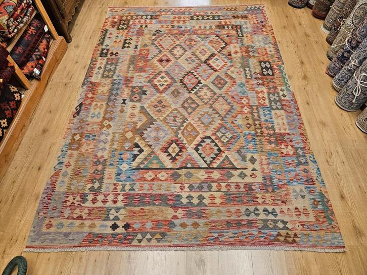 Handgeweven oosterse wollen kelim 284x194, Huis en Inrichting, Stoffering | Tapijten en Kleden, Nieuw, 150 tot 200 cm, 200 cm of meer
