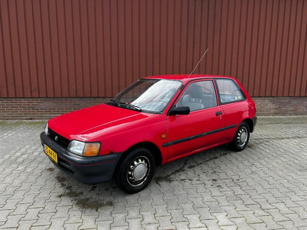 Toyota Starlet 1.3 XLI U9 1991 Rood, Auto's, Toyota, Stof, 74 pk, 4 cilinders, Starlet