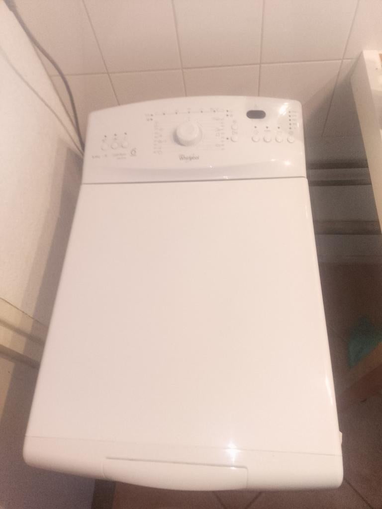 Zo goed als nieuwe Whirlpool bovenlader wasmachine 5.5 kg, Ophalen, 1200 tot 1600 toeren, 4 tot 6 kg, Bovenlader