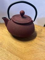 Gietijzeren theepot met zeef, Ophalen