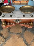 Oude weegschaal met gewichten, Ophalen