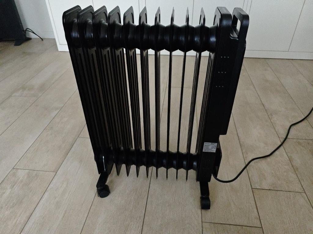 OmniWarm 2500W Oliegevulde Radiator met 11 Lamellen, Ophalen, 30 tot 80 cm, Radiator, Minder dan 60 cm