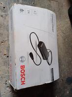Bosch acculader elektrische fiets, Fietsen en Brommers, Fietsaccessoires | Fietsaccu's, Ophalen of Verzenden