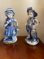 2 decoratieve beelden – jongen en meisje, Ophalen of Verzenden