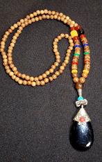 Oosterse ketting houten kralen met zwarte hanger, Ophalen of Verzenden, Nieuw, Overige materialen