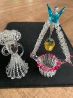 Glazen Figuurtjes, Ophalen