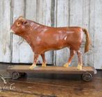 Grote oude stier van papier maché op plankje met wielen, Ophalen of Verzenden