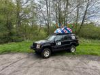 Jeep Grand Cherokee 4.0 I AUT 4WD Zwart | Grutte Pier Editie, Auto's, Origineel Nederlands, Te koop, Benzine, 3500 kg