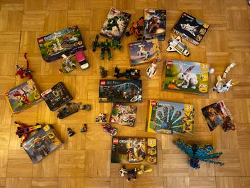 14 complete lego sets & 2 poppetjes beschikbaar voor biedingen