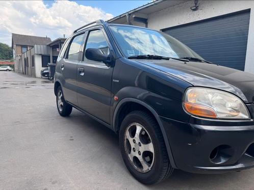 Suzuki Ignis 1.3 GL 2002 Zwart, Auto's, Suzuki, Bedrijf, Ignis, Airbags, Airconditioning, Bluetooth, Centrale vergrendeling, Dakrails